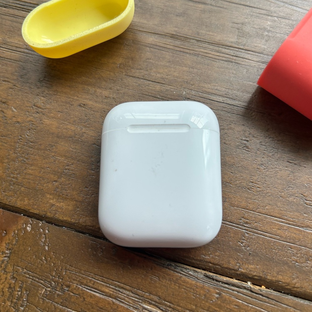 AirPods with Red and Yellow Case - Picture 4 of 7
